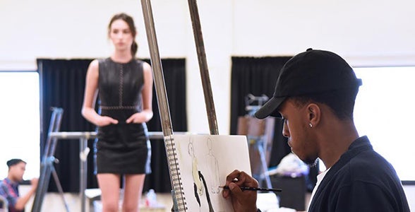 student drawing model