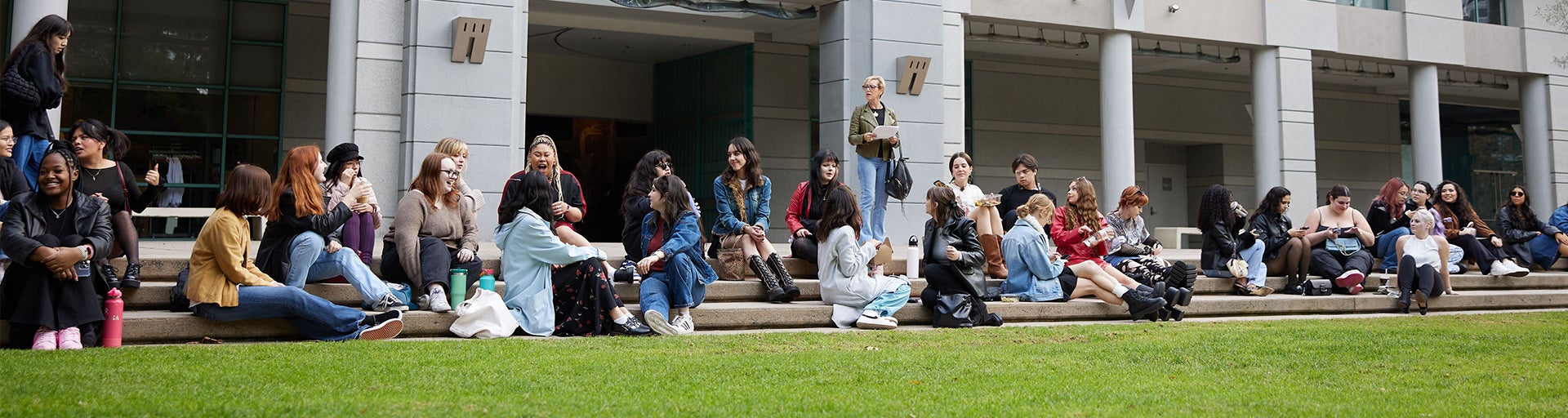 ASU FIDM Students on lawn outside building